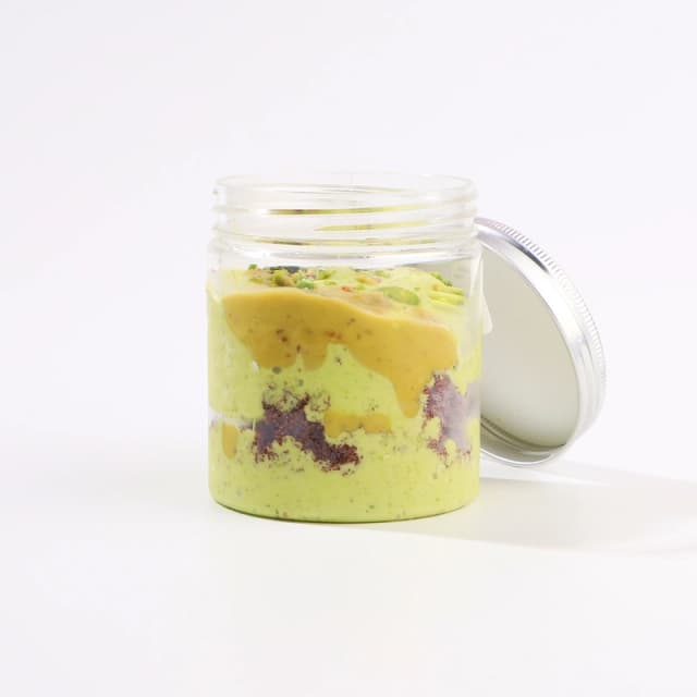 Pistachio ice cream in a jar